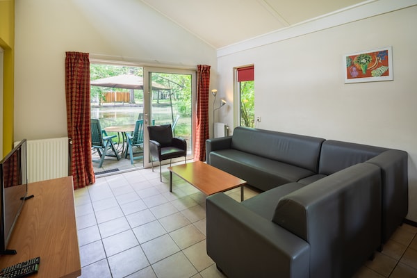 Foto van 6-persoons Comfort vakantiehuis met sauna. - Vakantiehuis in Kootwijk - LivingRoom