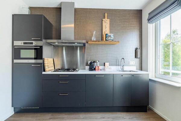 Foto van Luxe appartement in Koudekerke met sauna - Vakantiehuis in Koudekerke - Kitchen