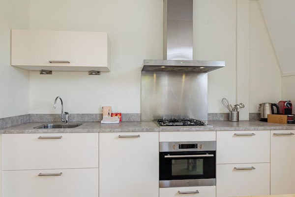 Foto van Luxe appartement dicht bij het strand - Vakantiehuis in Koudekerke - Kitchen