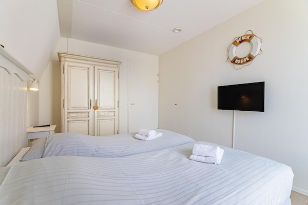 Foto van Luxe appartement dicht bij het strand - Vakantiehuis in Koudekerke - BedRoom
