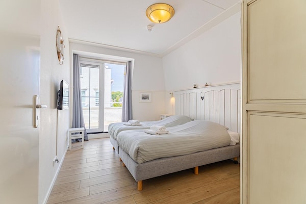 Foto van Luxe appartement dicht bij het strand - Vakantiehuis in Koudekerke - BedRoom