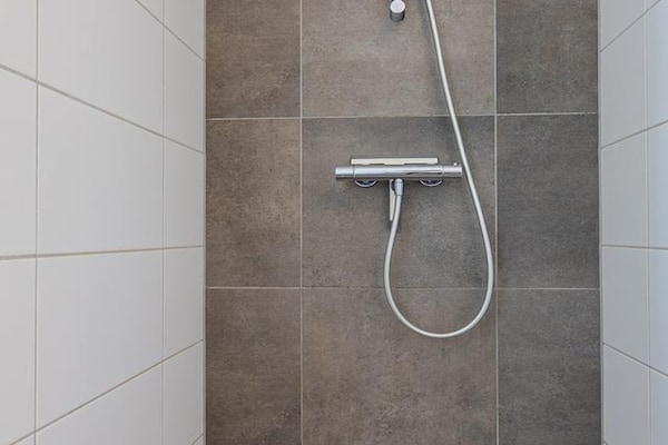 Foto van Luxe appartement dicht bij het strand - Vakantiehuis in Koudekerke - BathRoom