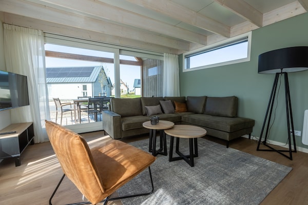 Foto van Duinlodge op vakantiepark, strand op 1,3 km - Vakantiehuis in Cadzand - LivingRoom