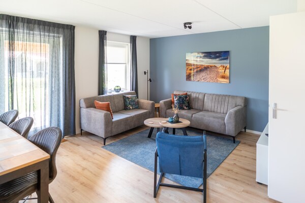 Foto van Kustuitje met sauna - Vakantiehuis in Scherpenisse - LivingRoom