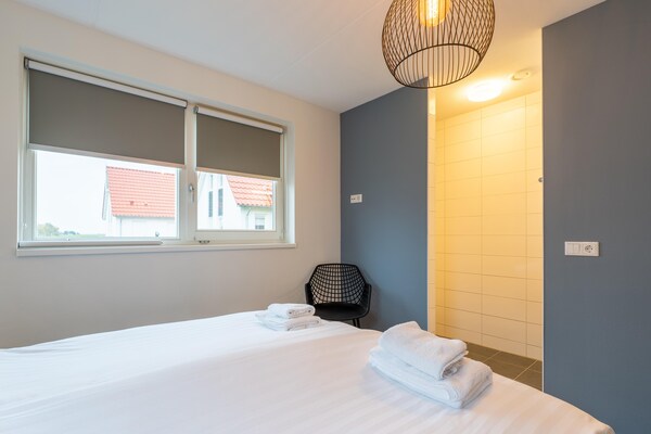 Foto van Modern vakantiehuis aan zee met sauna - Vakantiehuis in Scherpenisse - BedRoom