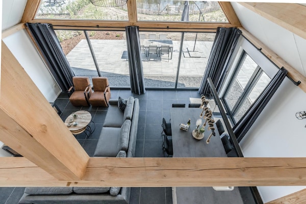 Foto van Chique verblijf met rieten dak - Vakantiehuis in Baarle-Nassau - LivingRoom