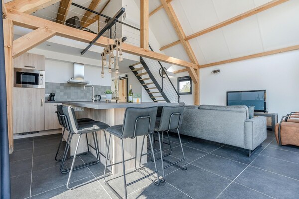 Foto van Chique verblijf met rieten dak - Vakantiehuis in Baarle-Nassau - LivingRoom