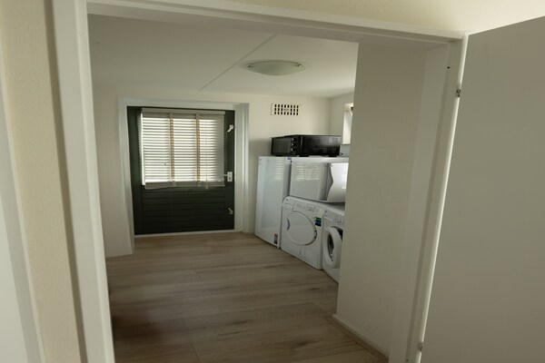 Foto van Charmant vakantiehuis met tuin - Vakantiehuis in Ewijk - BathRoom