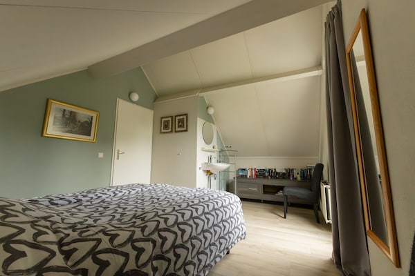 Foto van Gezellig vakantiehuis met tuin - Vakantiehuis in Ewijk - BedRoom