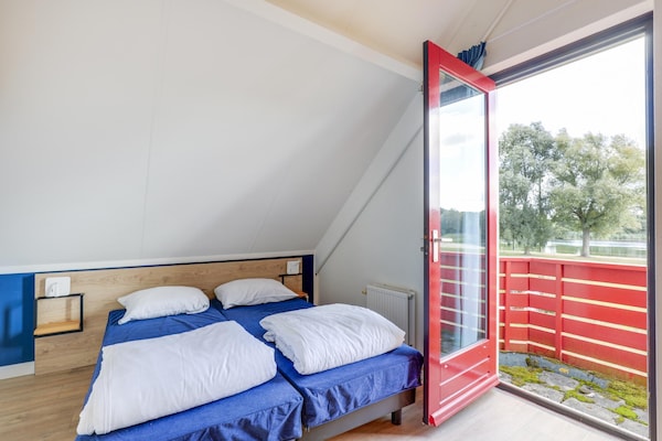 Foto van 6-pers. sauna bungalow aan het meer - Vakantiehuis in Ewijk - BedRoom