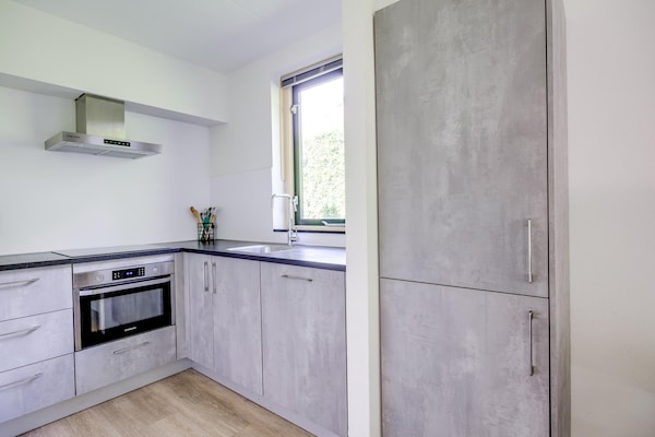 Foto van Beboste bungalow Ewijk voor 6 - Vakantiehuis in Ewijk - Kitchen