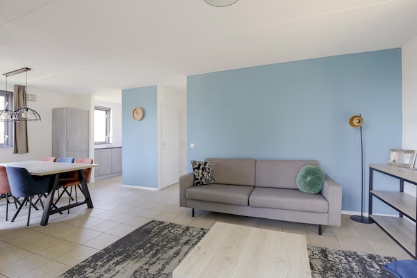 Foto van Rustige bosbungalow voor 6 personen - Vakantiehuis in Ewijk - LivingRoom