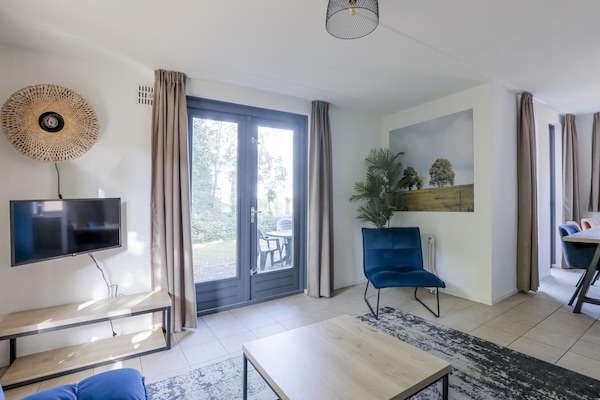 Foto van Rustige bosbungalow voor 6 personen - Vakantiehuis in Ewijk - LivingRoom