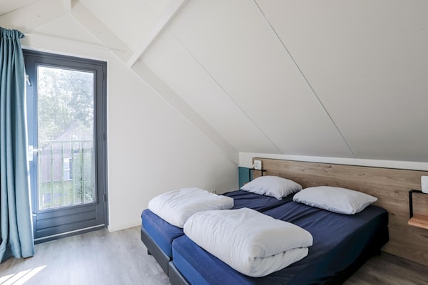 Foto van Rustige bosbungalow voor 6 personen - Vakantiehuis in Ewijk - BedRoom