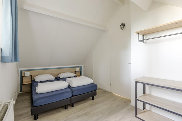 Foto van Rustige bosbungalow voor 6 personen - Vakantiehuis in Ewijk - BedRoom