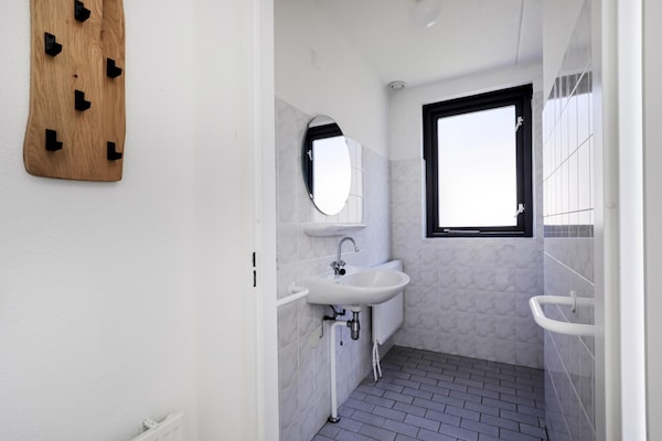 Foto van Rustige bosbungalow voor 6 personen - Vakantiehuis in Ewijk - BathRoom