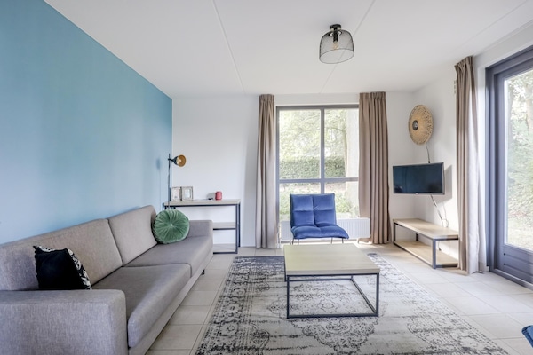 Foto van Rustige bosbungalow voor 6 personen - Vakantiehuis in Ewijk - LivingRoom