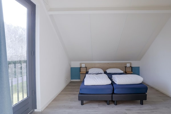 Foto van Rustige bosbungalow voor 6 personen - Vakantiehuis in Ewijk - BedRoom