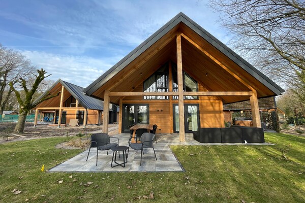 Foto van Bos Villa met Hottub 6 personen - Vakantiehuis in Wekerom - ExteriorSummer