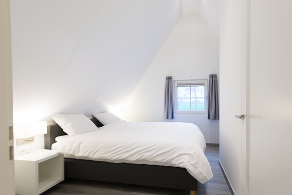 Foto van Gezellig groepsverblijf met open haard - Vakantiehuis in Hellendoorn - BedRoom
