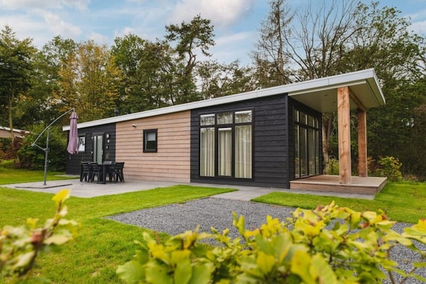 Foto van Luxe boslodge met privésauna - Vakantiehuis in Rijssen - ExteriorSummer