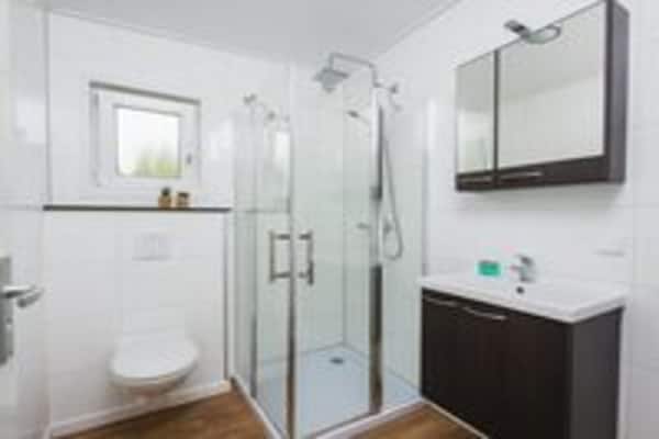 Foto van Luxe boslodge met privésauna - Vakantiehuis in Rijssen - BathRoom