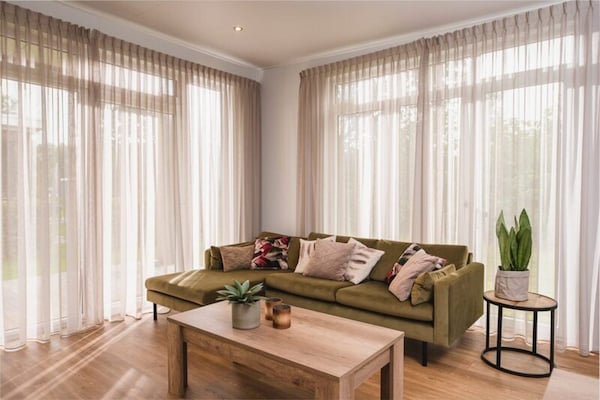 Foto van Luxe boslodge met privésauna - Vakantiehuis in Rijssen - LivingRoom