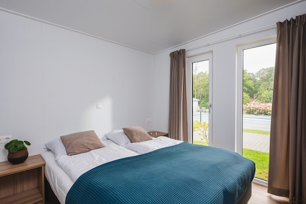 Foto van Luxe boslodge met privésauna - Vakantiehuis in Rijssen - BedRoom
