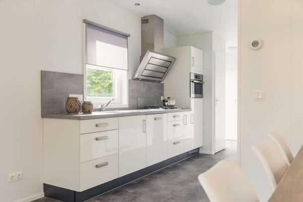 Foto van Luxe boslodge met privésauna - Vakantiehuis in Rijssen - Kitchen