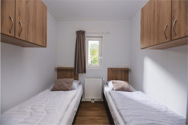 Foto van Luxe boslodge met privésauna - Vakantiehuis in Rijssen - BedRoom