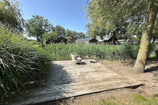 Foto van Chalet in Biddinghuizen, zwembadfaciliteiten - Vakantiehuis in Biddinghuizen - TerraceBalcony