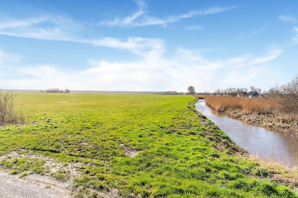 Foto van Luxe chalet met eigen sloep en haven in Bantega Friesland - AreaSummer5KM