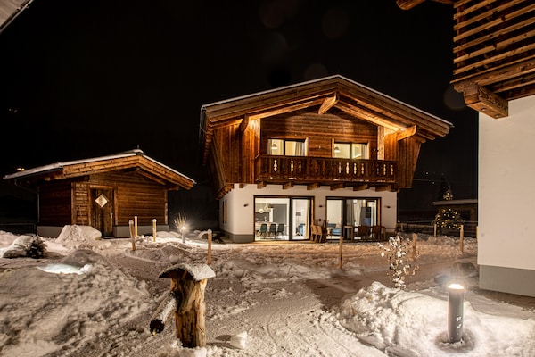 Foto van Chalet in Pinzgau bij Skipistes & Sauna - Vakantiehuis in Wald im Pinzgau - ExteriorWinter