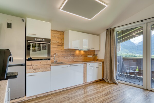 Foto van Chalet in Neukirchen met Bergzicht - Vakantiehuis in Neukirchen - Kitchen