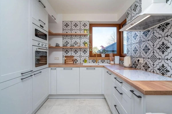 Foto van Comfortabele vakantievilla met sauna en jacuzzi - Vakantiehuis in Marcyporeba - Kitchen
