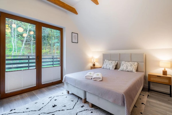 Foto van Comfortabele vakantievilla met sauna en jacuzzi - Vakantiehuis in Marcyporeba - BedRoom