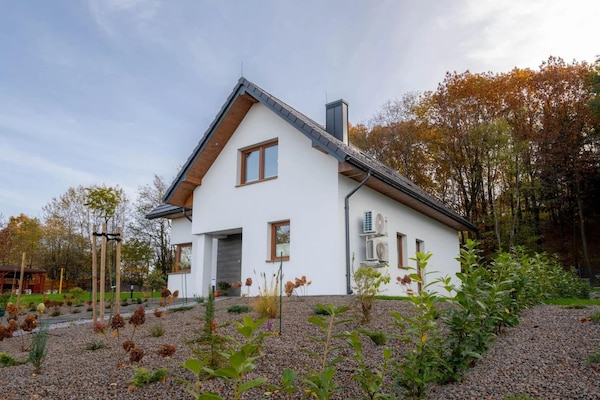 Foto van Comfortabele vakantievilla met sauna en jacuzzi - Vakantiehuis in Marcyporeba - ExteriorSummer