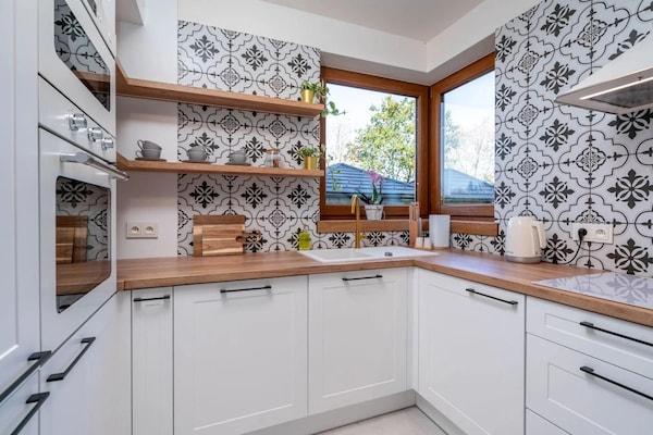 Foto van Comfortabele vakantievilla met sauna en jacuzzi - Vakantiehuis in Marcyporeba - Kitchen