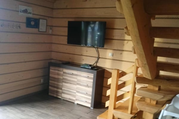 Foto van Comfortabele vakantiehuizen met open haard - Vakantiehuis in Lubrza - LivingRoom