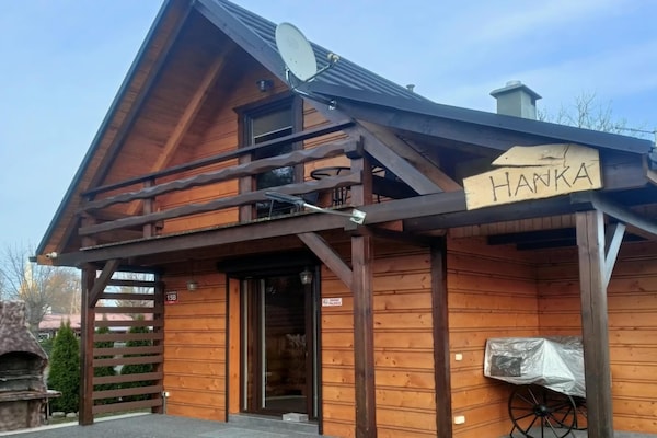 Foto van Comfortabele vakantiehuizen met open haard - Vakantiehuis in Lubrza - ExteriorSummer