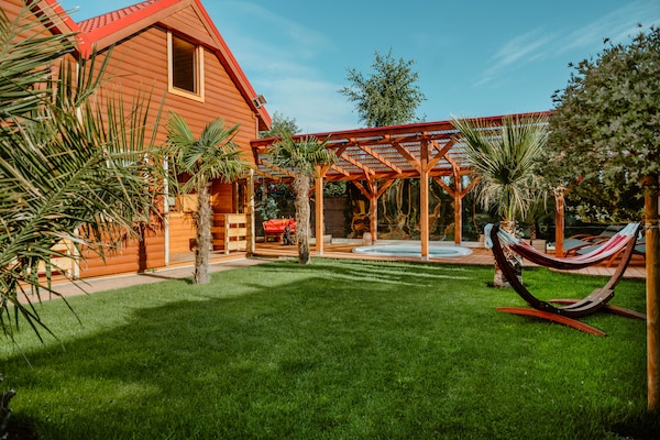 Foto van Comfortabele huizen met een spa-zone - Vakantiehuis in Wrzosowo - GardenSummer