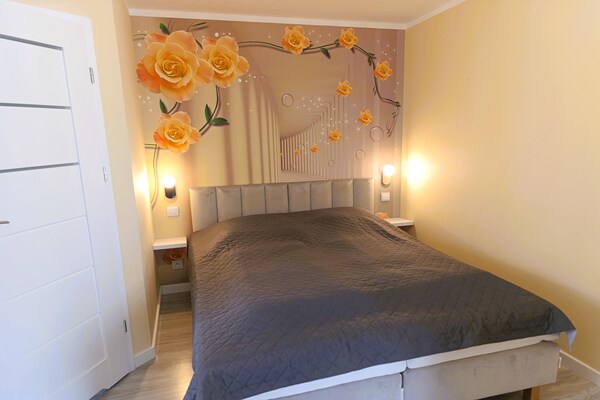 Foto van Appartement in Międzywodzie met zwembad - Vakantiehuis in Międzywodzie - BedRoom