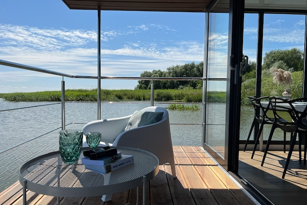 Foto van Woonboot in Łazy bij Jamno-meer - Vakantiehuis in Łazy - ViewSummer