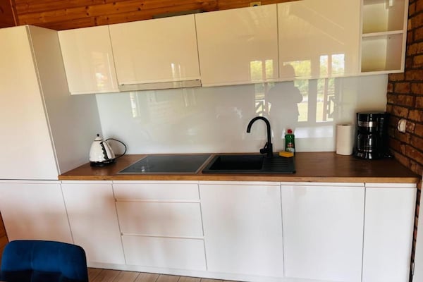 Foto van Comfortabele vakantiehuizen met zwembaden - Vakantiehuis in Mielno - Kitchen