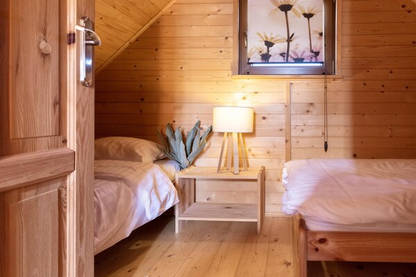 Foto van Vakantiehuizen met baden, attracties voor kinderen - BedRoom