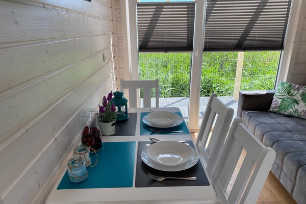 Foto van Comfortabele vakantiehuizen met airconditioning. - Vakantiehuis in Dabki - DiningRoom