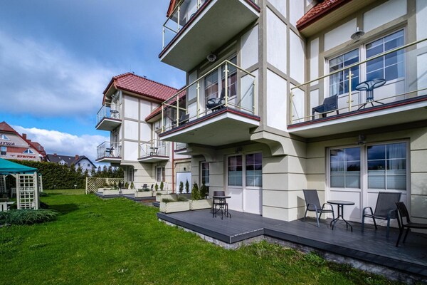 Foto van Luxe appartement voor 6 personen, met een badkuip - Vakantiehuis in Debki - ExteriorSummer