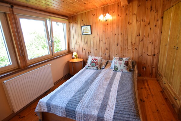 Foto van Comfortabel vakantiehuis met een eigen tuin. - Vakantiehuis in Kopalino - BedRoom