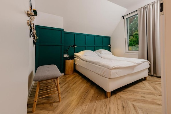 Foto van Groot vakantiehuis met jacuzzi en sauna. - Vakantiehuis in Kopalino - BedRoom