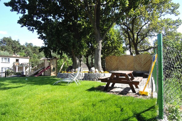 Foto van Bungalow in Miedzyzdroje bij Oostzeestrand - Vakantiehuis in Miedzyzdroje - GardenSummer
